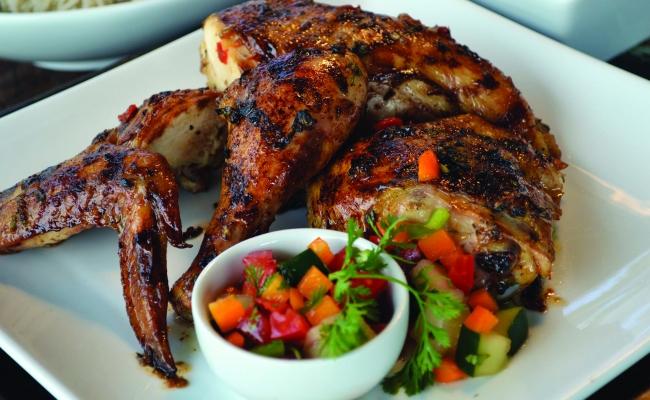 Elise Yap shares the story of Roadside Pan Chicken. Pictured here, her Original Grill Chicken